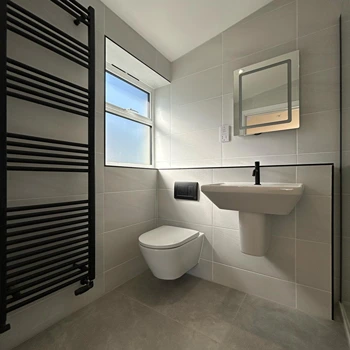 Towel radiator and toilet